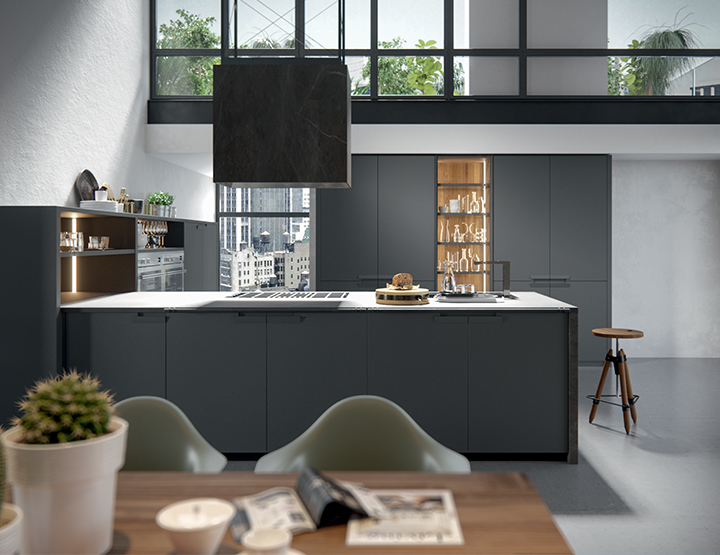 Cuisine contemporaine de marque Valdesign en laqueé mat gris foncé et plan de travail en inox massif